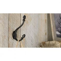5-1/2 in. (140 mm) Matte Black Classic Wall Mount Hook by Richelieu Hardware -Storage Concepts Sales Store matte black richelieu hardware hooks t5618900 1f 1000